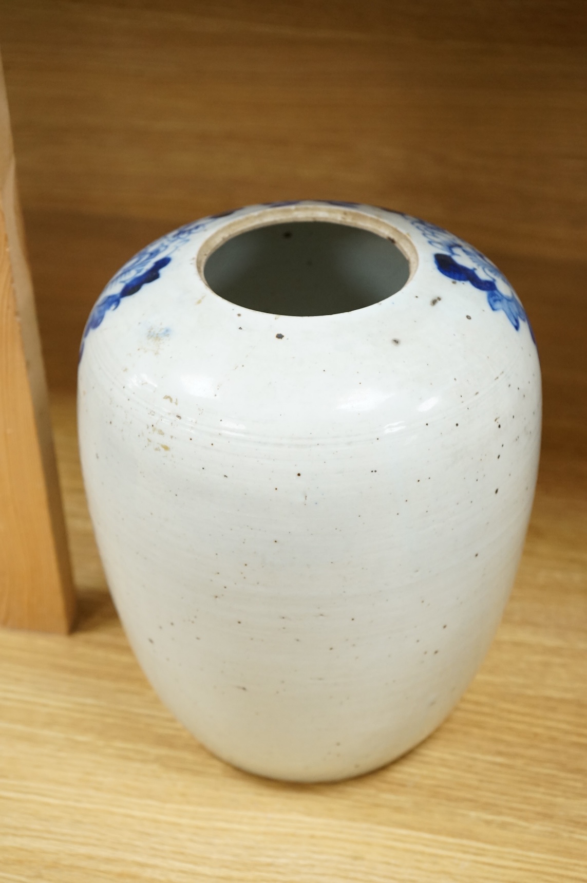A 19th century Chinese blue and white jar, lacking cover, 28cm high